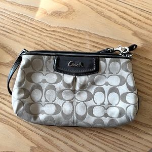Coach wristlet/wallet. Free beauty gift with purchase!